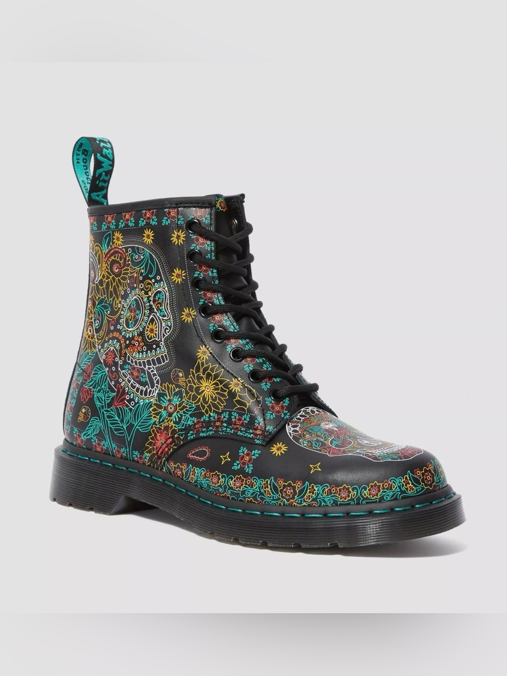Dr. Martens 1460 Skull boots, with the Día de los Muertos sugar-skull and floral